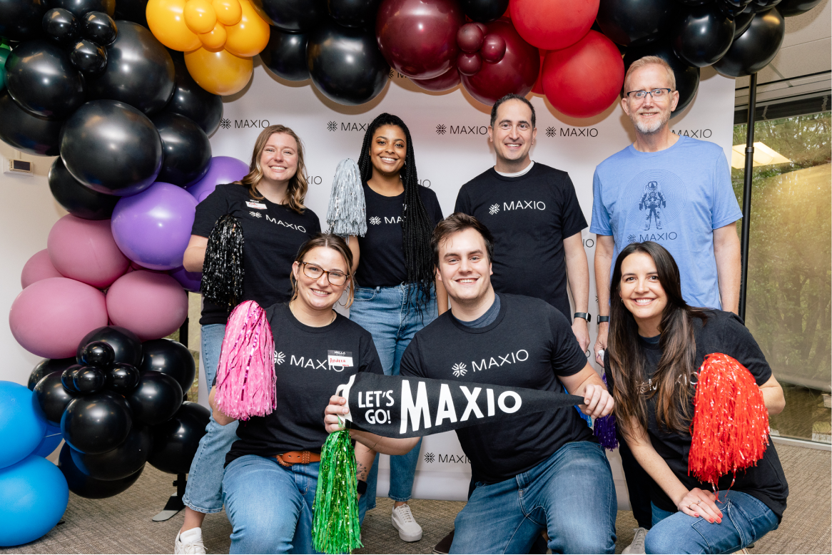 Several of the Maxio team celebrating