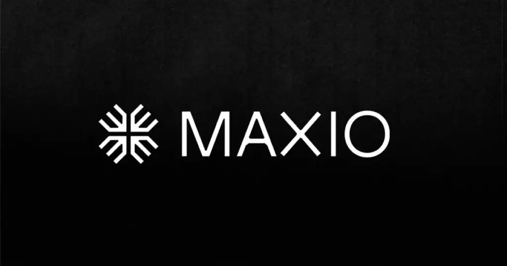 A snowflake-like logo is next to the text "MAXIO" on a black background, conveying a clean, modern design.