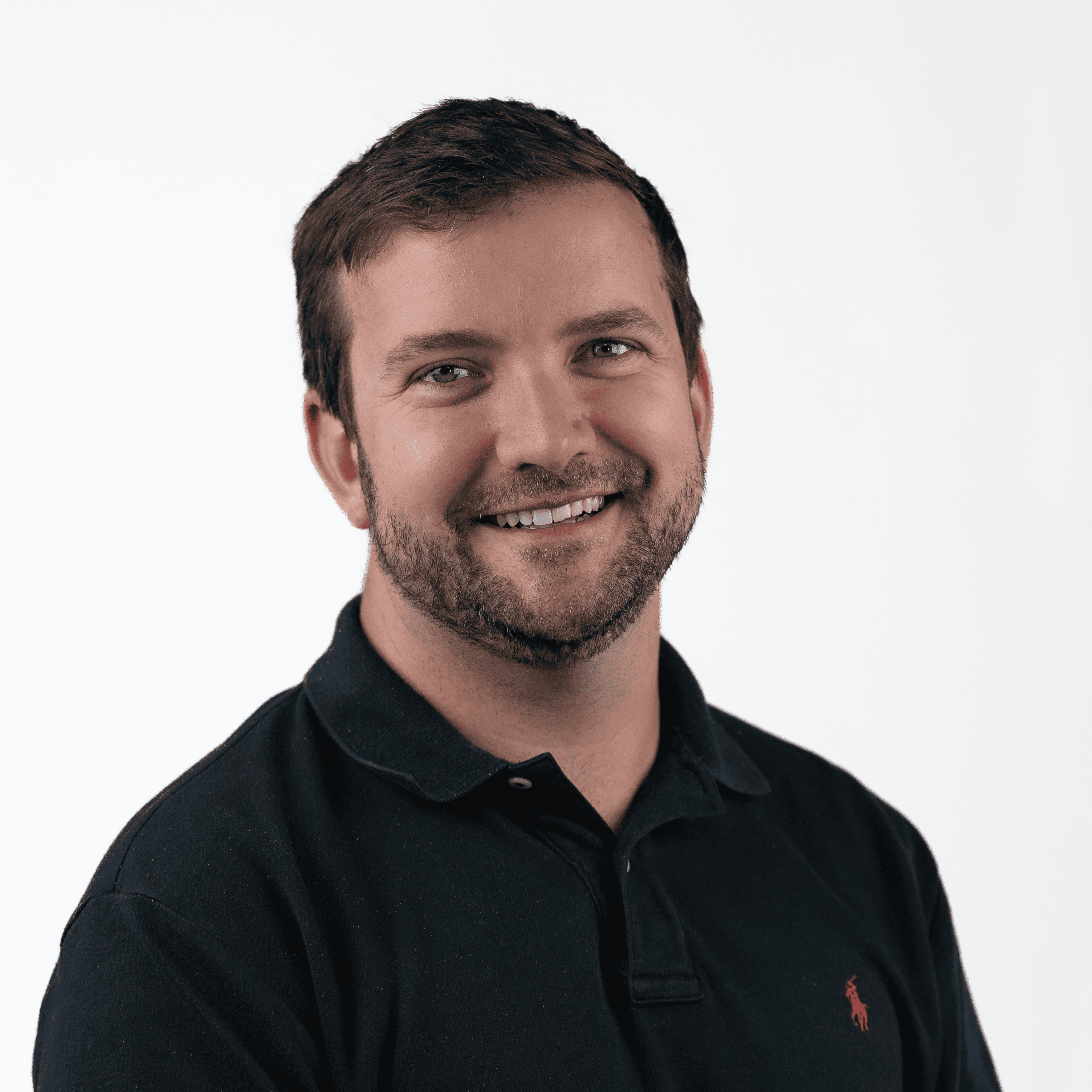 Chris Maxio executive leadership team headshot with professional background.