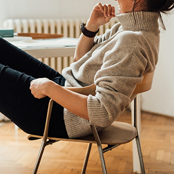 Woman sitting in chair