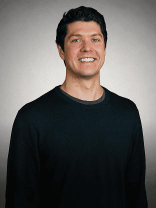 Smiling man representing Maxio team for About Us page.