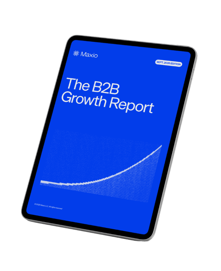 Tablet showing Maxio B2B Growth Report with upward trend graph and blue background.