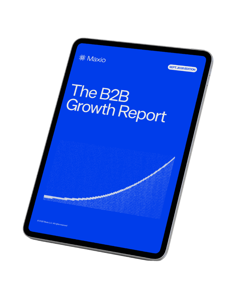Tablet showing Maxio B2B Growth Report with upward trend graph and blue background.